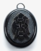 A Victorian mourning pendant, monogram to the rear which is in need of repair