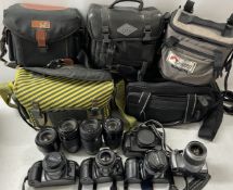 A collection of film cameras to include a Minota Dynax 5xi, a Canon EOS 650, a Canon EOS 300 and