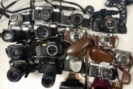 A box of film cameras to include a Mamiya ZE with a Osawa 75-150mm lens, a Pentax A3, a Pentax P30