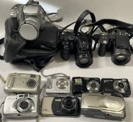 A box of digital cameras to include a FujiFilm FinePix F440, a FujiFilm FinePix S4800, a Pentax