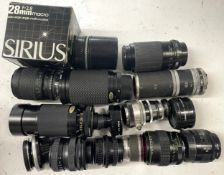 A box of camera lens to include a Agilux Telephoto 16cm F5.5 lens, a Tokina 60-300mm 1:4-5.6 lens, a