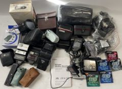 A Sony Mini Disc Walkman MZ-NH900 and a box of camera accessories. (1 box)