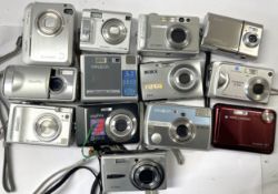 A collection of digital cameras to include, a Fuji Fine Pix A120, a Konica Minolta DiMage X1 and a