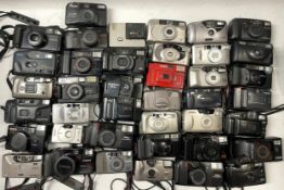 A box of compact film cameras to include a Canon Sprint, a Nikon TW Zoom 35-70, a Yashica Zoom