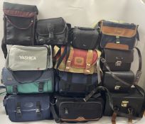 A large collection of camera bags and cases.