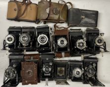 A box of folding cameras to include a Zeiss Ikon Nettar, various kodak cameras and others.