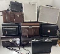A large collection of camera bags and cases.