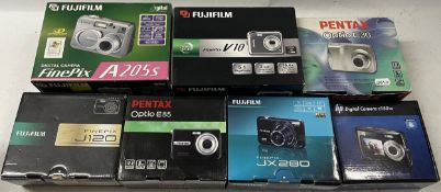 A collection of digital cameras to include, a Fuji Fine Pix J120, a Pentax Optio E30 and a Pentax