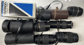 A box of camera lens to include a Tamron 80-210mm 3.8-4 lens, a Canon EF 75-300mm 1:4-5.6 III