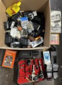 A collection of camera accessories to include, flash units, lens filters and light monitors. (One