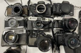 A collection of film cameras to include, a Yashica FX-D, a Yashica FX-3 and a Yashica FX-103. (One