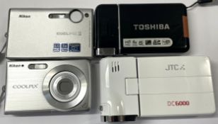 A collection of digital cameras to include, Toshiba Camileo, a Nikon Coolpix S5 and a Nikon
