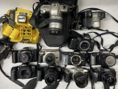 A box of film cameras to include a Nikon F-801, a Canon EOS 500n with a Canon 35-80mm lens, a