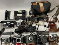 A collection of film cameras to include a Praktica B200, a Fujica AX-1, a Praktica Super TL and
