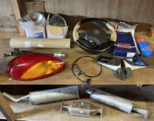 A collection of car parts, predominately late classic Mini parts to include, part exhaust system