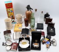 A collection of various vintage barware and collectables, including corkscrews, bottle openers,