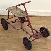 A mid twentieth century child's hand powered rolling cart utilising a push-pull mechanism