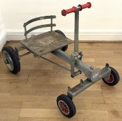 A mid twentieth century child's hand powered rolling cart utilising a push-pull mechanism