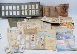 A large collection of mid 20th century pictorial cigarette cards, loose and in albums, in one box.