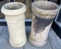 A pair of reclaimed chimney pots, both measure approximately 62cm tall. (2)
