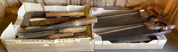 Two boxes of carpenters tools to include, large chisels, gouges, spirit levels and saws. (2)