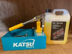 A Katsu Tools hydrolastic suspension pump/ water pressure tester, together with a part used 5