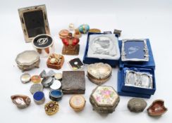 A collection of various trinkets and cabinet pieces, including pill boxes, plated Jewellery caskets,