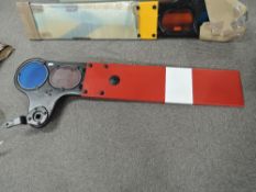 BR Home Signal Arm in red and white with blue glass and orange lenses, having been restored,