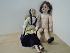 Early 20th century Dolls, German Bisque head having sleep brown eyes, open mouth with 4 teeth,
