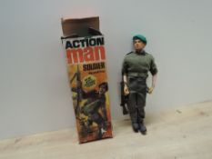 1964 Palitoy 34052 Action Man Soldier with Clothing and Gun in original box, 'now with gripping