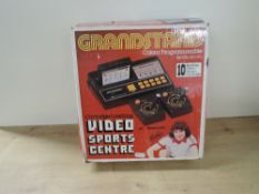 Grandstand Model SD070 Cartridge Loading Video Sports Centre, Batch No 07-81-02 with two controllers