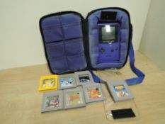 Nintendo Game Boy Colour in Purple, Model No CGB-001 CH1 0502009 with original card box and