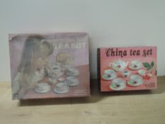 Two Children's China Tea Sets, both having 4 Cups and Saucers, Tea Pot, Sugar Bowl and Milk Jug,