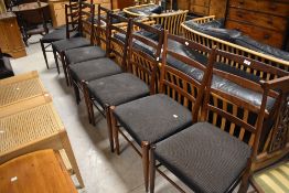 A set of eight vintage ladder back dining chairs, probably G plan or similar