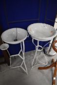 Two metal wash stands in the French style