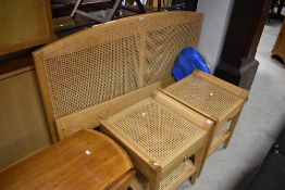 A modern light wood and canework double bed and pair of similar bedside table, by Cotswold Caners (