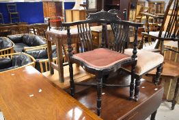A Victorian mahogany corner chair having turned frame and X stretcher, and a similar period