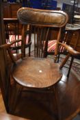 A 19th Century carver chair having spindle back and upholstered back rail