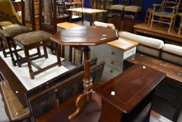 A 19th Century mahogany occasional table having octagonal top, turned column and triple shaped