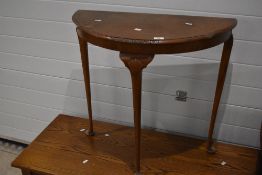 A priory style TV cabinet and a demi lune table