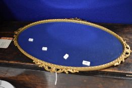 A vintage gilt frame wall mirror of oval form, approx. 74 x 47cm