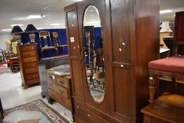 An Edwardian mahogany mirror door wardobe and dressing table base, robe dimensions approx. 190 x 120