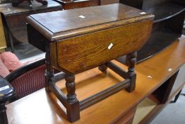 An early to mid 20th Century oak drop leaf occasional table, width approx 58cm, height 46cm