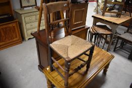 A 19th Century rush seated kitchen chair