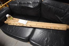 A traditional peg rug frame and accessories