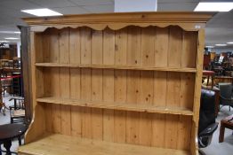 A modern pine kitchen dresser, width approx. 152cm, height 192cm
