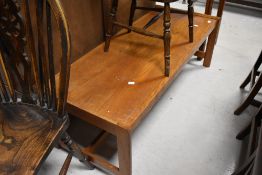 A vintage Gordon Russell teak coffee table, approx. 122 x 51cm