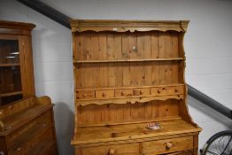 A traditional pine dresser, width approx. 126cm