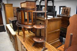 An early 20th Century oak folding cake stand