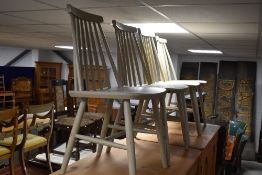 A set of four traditional pained kitchen chairs
